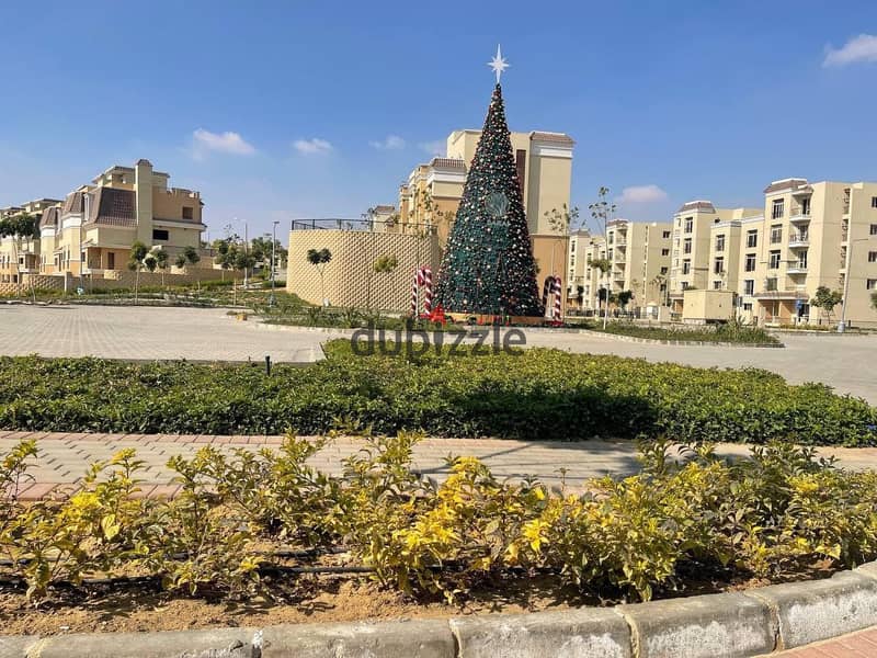 Apartment with a private garden for sale in the best location in front of Madinaty with a 10% down payment and installments 1