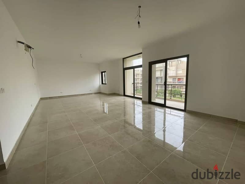 Apartment with a private garden for sale in the best location in front of Madinaty with a 10% down payment and installments 5