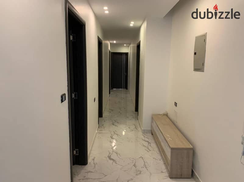 Apartment with a private garden for sale in the best location in front of Madinaty with a 10% down payment and installments 7