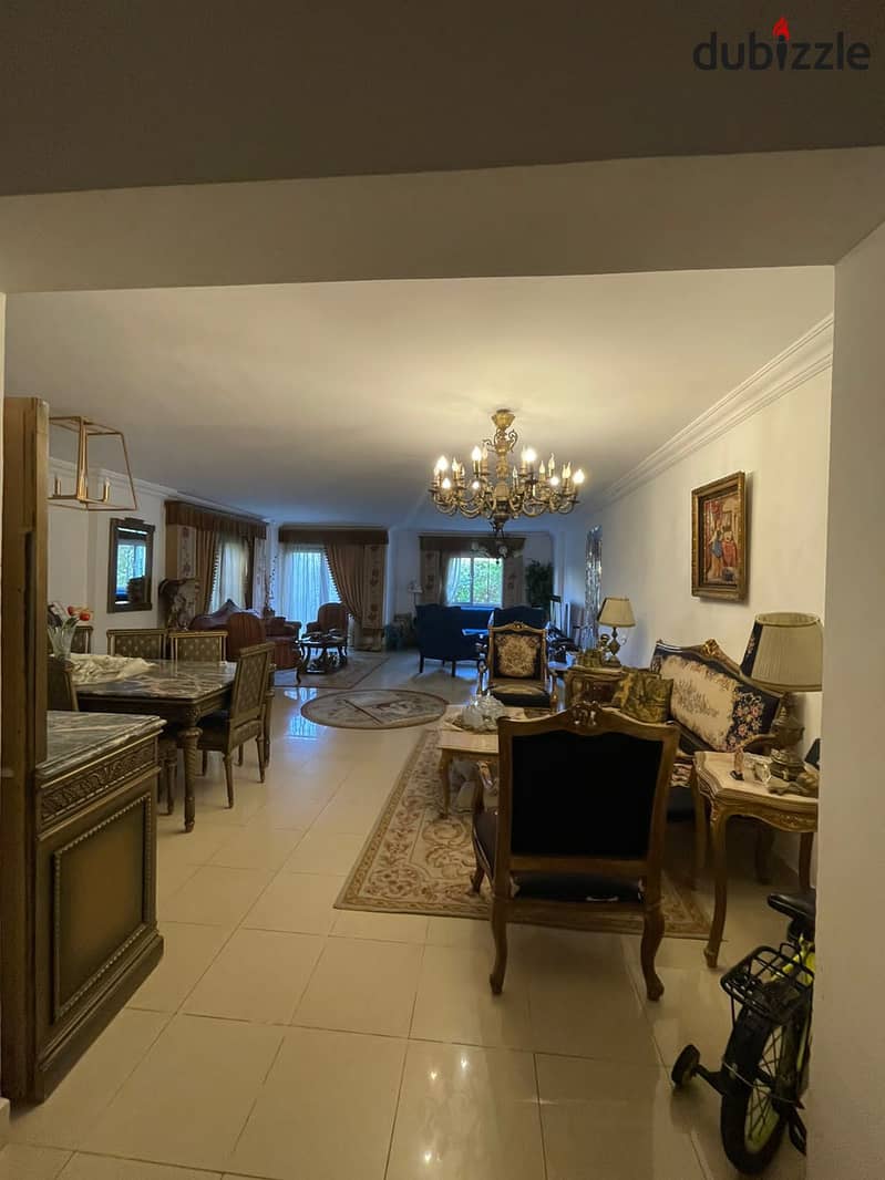 Ground floor apartment with a garden for sale in Al-Rehab City, 214 square meters in the seventh phase 4