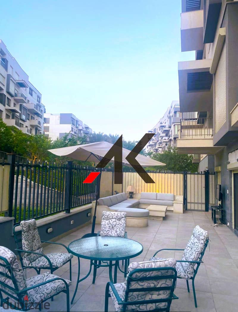 Prime Location Furnished Apartment with garden For Rent in Eastown - New Cairo 5