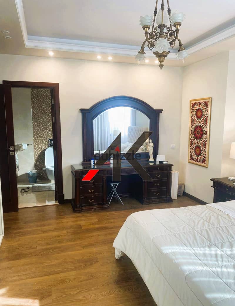 Prime Location Furnished Apartment with garden For Rent in Eastown - New Cairo 7