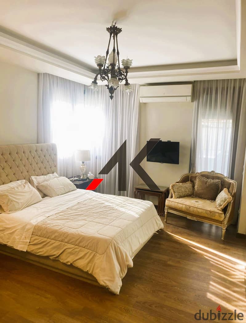 Prime Location Furnished Apartment with garden For Rent in Eastown - New Cairo 11