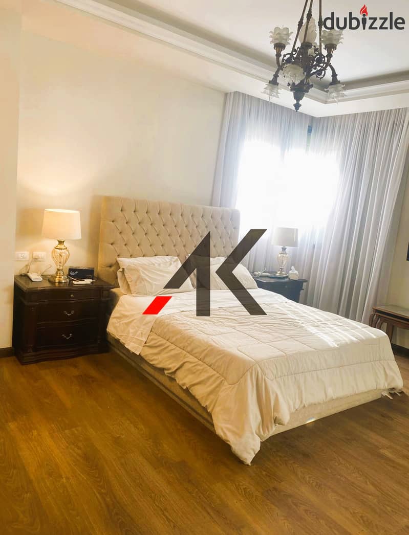 Prime Location Furnished Apartment with garden For Rent in Eastown - New Cairo 13