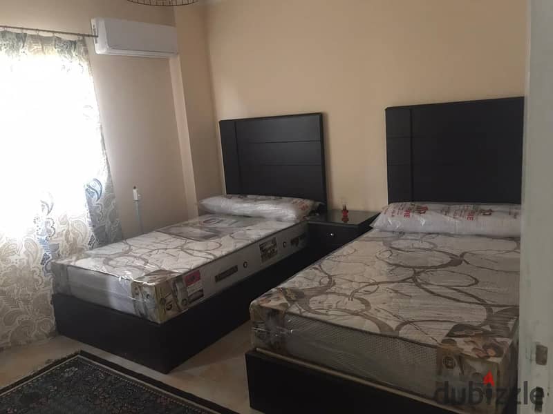 Fully furnished apartment for rent, air-conditioned, in Ashrafia Compound, First Settlement 2