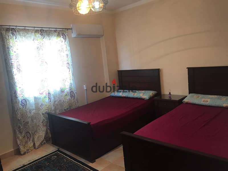 Fully furnished apartment for rent, air-conditioned, in Ashrafia Compound, First Settlement 3