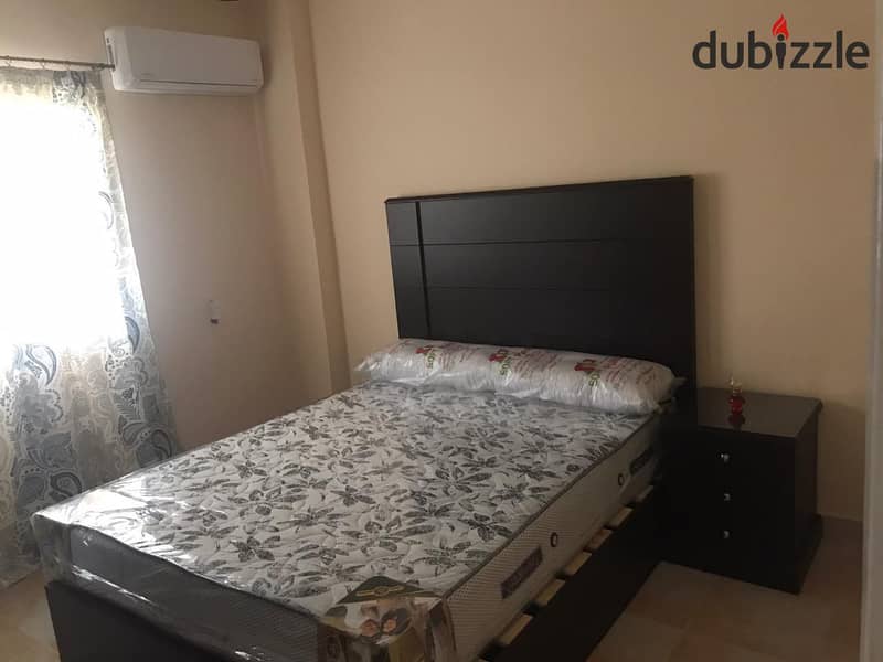 Fully furnished apartment for rent, air-conditioned, in Ashrafia Compound, First Settlement 4