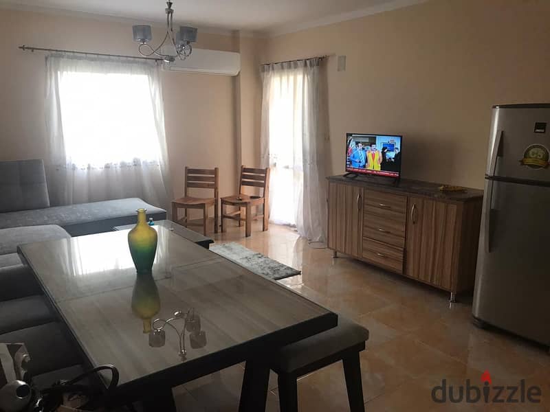 Fully furnished apartment for rent, air-conditioned, in Ashrafia Compound, First Settlement 7