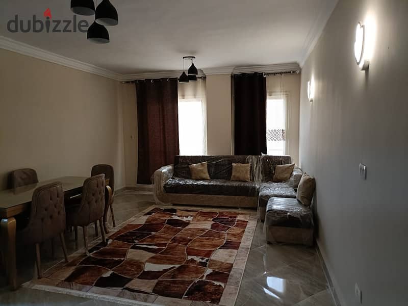 Furnished apartment for rent in the first compound in front of Gate 24, Al Rehab, in Dar Misr Al Qarnful 5