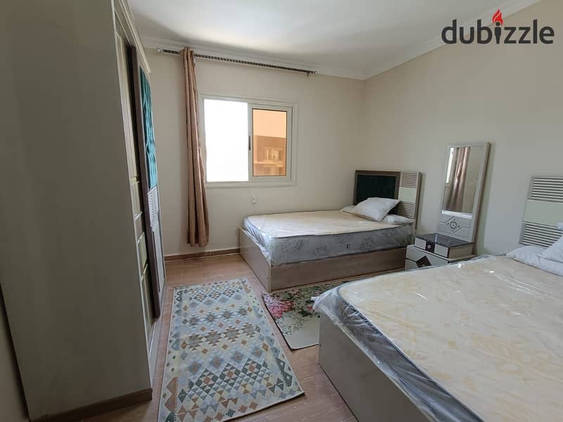 Furnished apartment for rent in the first compound in front of Gate 24, Al Rehab, in Dar Misr Al Qarnful 17