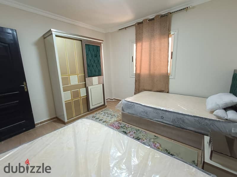 Furnished apartment for rent in the first compound in front of Gate 24, Al Rehab, in Dar Misr Al Qarnful 19