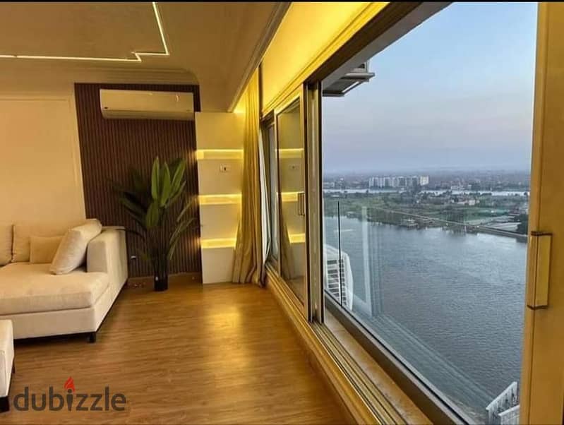 Own your unit in the first hotel project directly on the Nile 60Mfully fully finished and furnished with electrical appliances and air conditioning 0