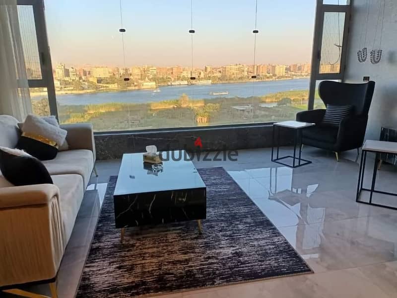 Own your unit in the first hotel project directly on the Nile 60Mfully fully finished and furnished with electrical appliances and air conditioning 4