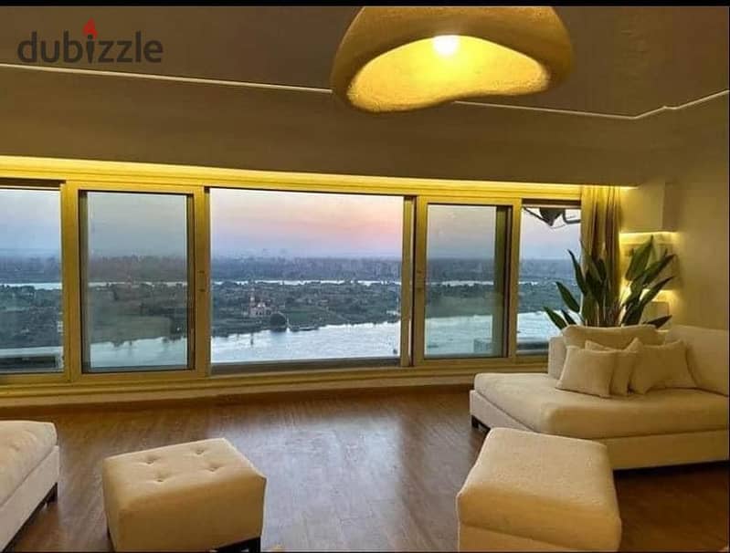 apartment for sale in ( Rêve Du Nil Tower Maadi ) - Ready to move -  ⁠Furnished with electrical appliances and air conditioning - Bua 60m 8