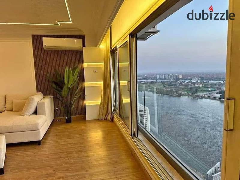 Ready to move a hotel apartment directly on the Nile, in installments 1