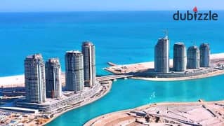 A Panoramic Sea View apartment  217 m " Fully finished with Acs" for sale in Alamein Towers - North Coast 0