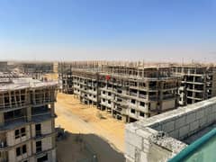 "Immediate delivery of a 155 sqm apartment in Badya, Palm Hills, in the heart of October with a 0% down payment and installments over 10 years. " 0