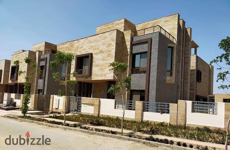 Own your villa in Taj City Compound, a distinctive townhouse, middle division, 155 m, with a direct view, with a down payment of 800 thousand and inst 1