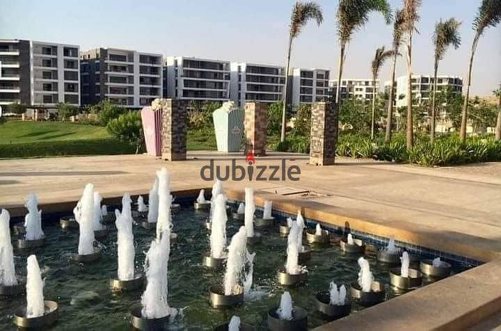 Penthouse with landscape view and lake, large area 225 m, private roof 77 m, in Taj City Compound in New Cairo, in front of Cairo Airport, with a 10% 1