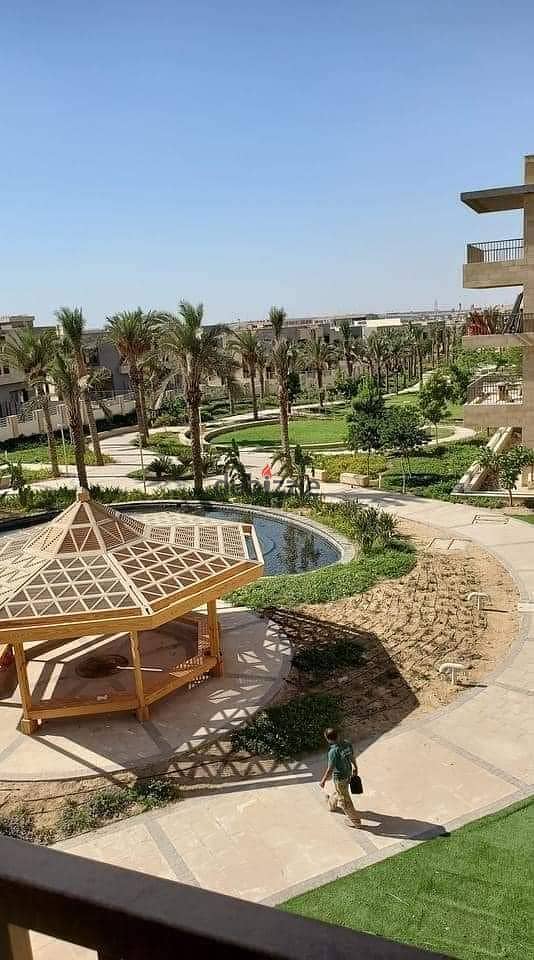 Penthouse with landscape view and lake, large area 225 m, private roof 77 m, in Taj City Compound in New Cairo, in front of Cairo Airport, with a 10% 6