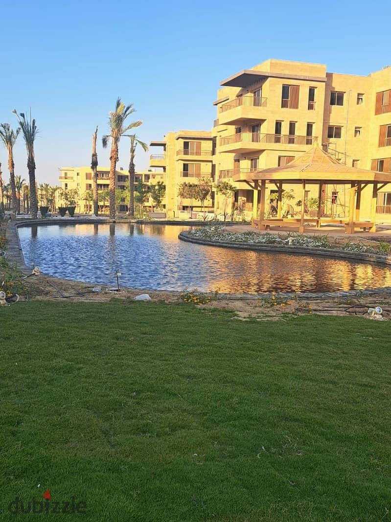 Penthouse with landscape view and lake, large area 225 m, private roof 77 m, in Taj City Compound in New Cairo, in front of Cairo Airport, with a 10% 19