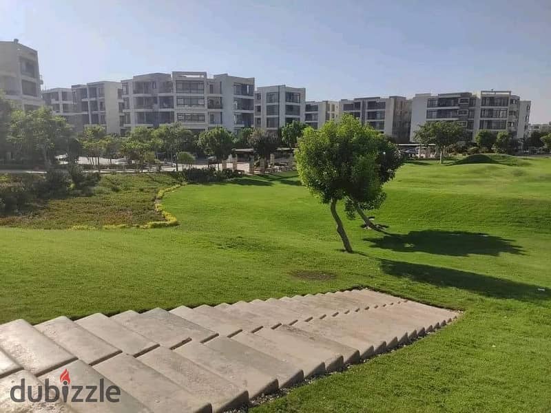 Two ground floor rooms with a garden of 115 m with a private garden of 60 m for sale in front of Cairo Airport in Taj City Compound, with installments 1