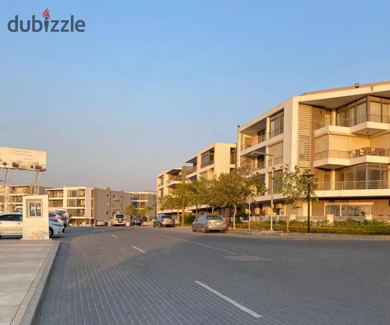 Two ground floor rooms with a garden of 115 m with a private garden of 60 m for sale in front of Cairo Airport in Taj City Compound, with installments 5