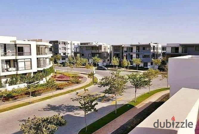 Two ground floor rooms with a garden of 115 m with a private garden of 60 m for sale in front of Cairo Airport in Taj City Compound, with installments 12