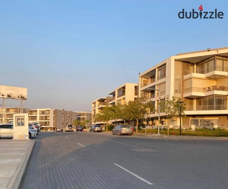 Duplex for sale in El Tagamoa, 208 m, very distinctive division, with a view, Origami Golf phase, in Taj City Compound, on Suez Road, with a 5% down p 5