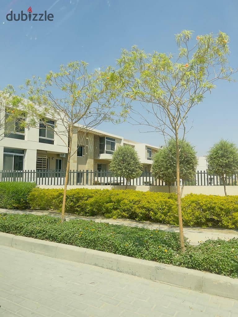 Duplex for sale in El Tagamoa, 208 m, very distinctive division, with a view, Origami Golf phase, in Taj City Compound, on Suez Road, with a 5% down p 12