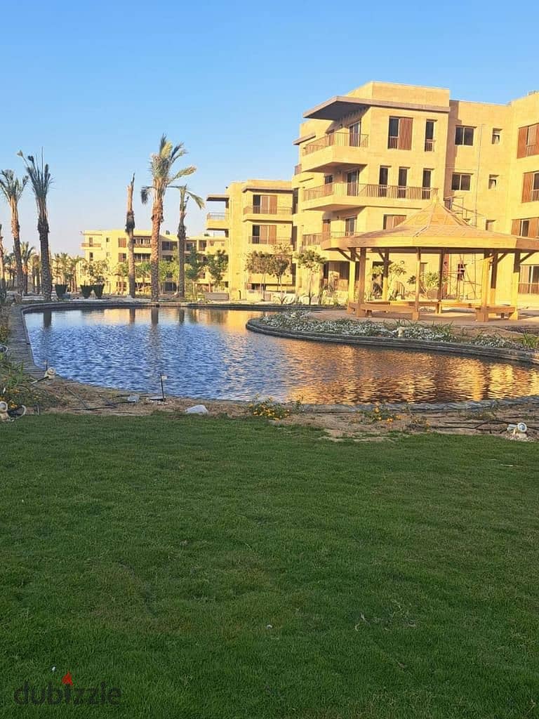 Duplex for sale in El Tagamoa, 208 m, very distinctive division, with a view, Origami Golf phase, in Taj City Compound, on Suez Road, with a 5% down p 13