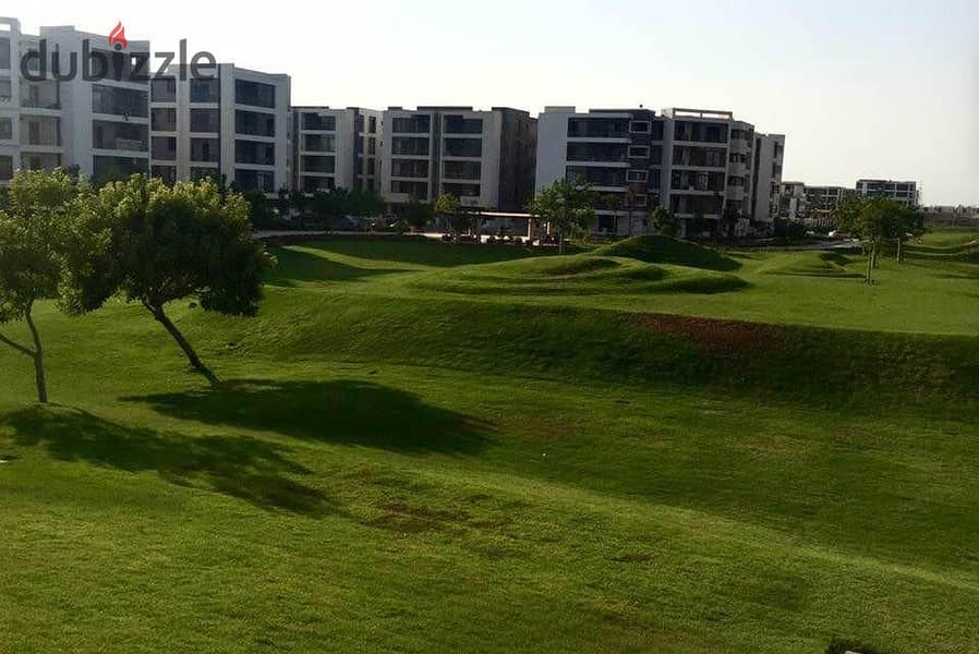 Duplex for sale in El Tagamoa, 208 m, very distinctive division, with a view, Origami Golf phase, in Taj City Compound, on Suez Road, with a 5% down p 17