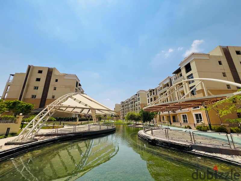 Town House Middle 206m + Garden 58m and Roof 14m 4 floors for sale in Sarai Compound in Mostakbal City with different divisions in installments over 8 11