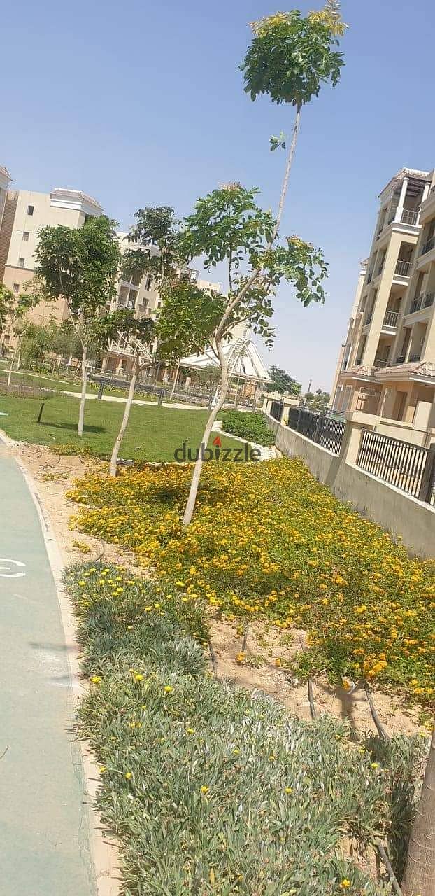 Town House Middle 206m + Garden 58m and Roof 14m 4 floors for sale in Sarai Compound in Mostakbal City with different divisions in installments over 8 16