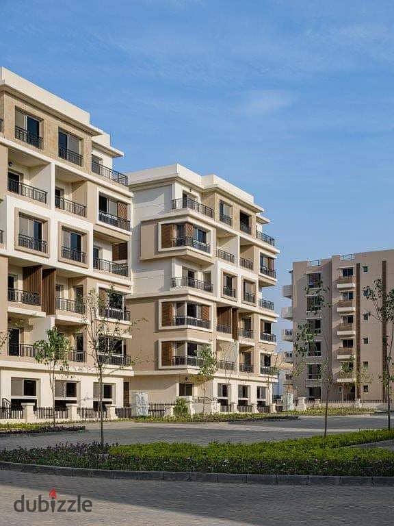 Own a 144 m² ground floor apartment with a 147 m² garden in Sarai Compound with distinguished services on the Suez Road and next to Madinaty with a 10 2