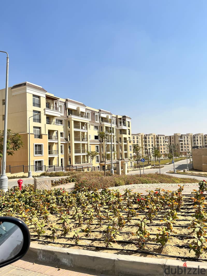 Own a 144 m² ground floor apartment with a 147 m² garden in Sarai Compound with distinguished services on the Suez Road and next to Madinaty with a 10 12