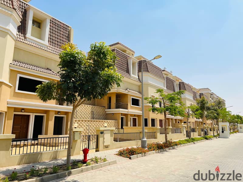 Townhouse villa 212 m corner with lake view, characterized by luxurious design and various divisions, 4 floors for sale in Mostakbal City in Sarai Com 15