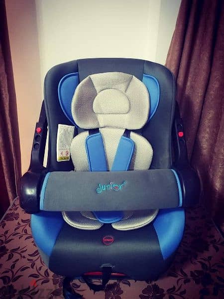 carseat stage 1,2 كارسيت جونيور  جديد لم يستخدم  كسر زيرو تصفيات جديد 2