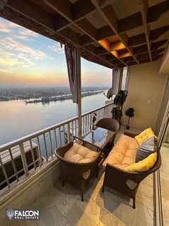 Hotel apartment with a panoramic view on the Nile Corniche, received within months, fully furnished with hotel services, next to the Hilton Nile pearl 0