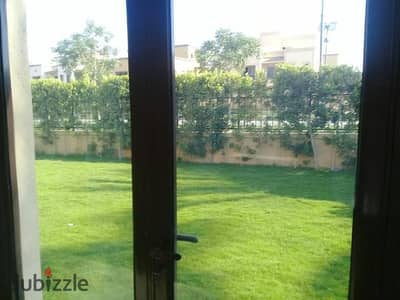 Ground floor apartment with garden for sale in Sarai Compound, Sarai - a wall in Madinaty Wall