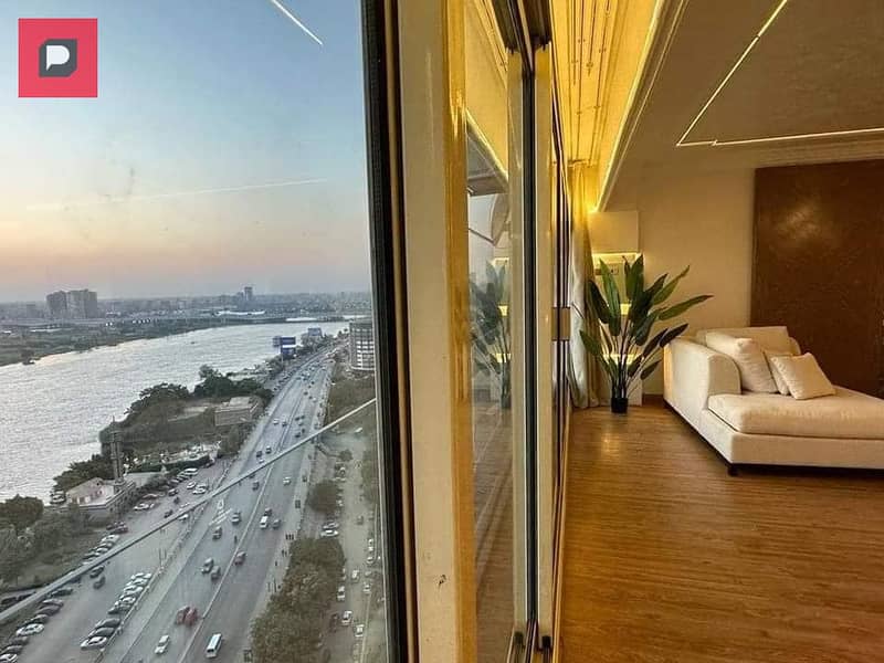 Hotel apartment for sale, ready to move fully finished and furnished, in Reve du Nile Hotel on the Maadi Corniche with a very special view of the Nile 1