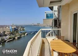 ready to live in now a fully furnished 100% hotel apartment with a Nile view (with hotel services) next to the Hilton Nile Corniche Hotel 0