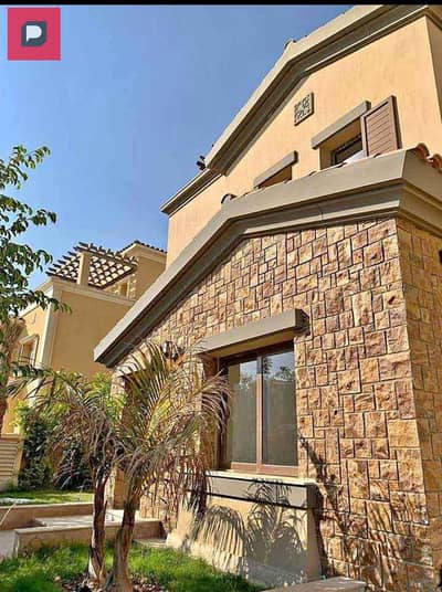 Corner villa for sale 205 meters in Telal East Compound, New Cairo, Fifth Settlement, near the American University, landscape view and lagoon,