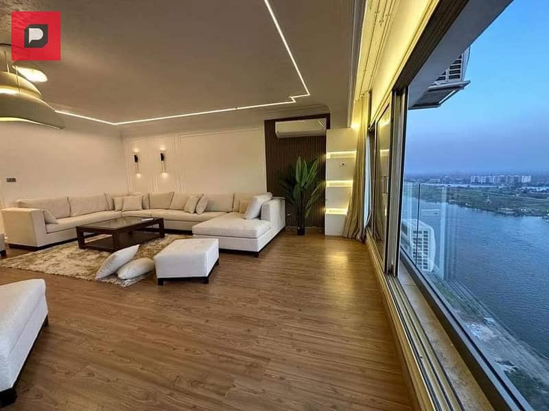 Service apartment for sale on the Nile in Maadi Corniche, finished with Acs and furniture,  on the 14th floor, overlooking Nile 2