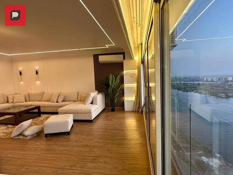 Service apartment for sale on the Nile in Maadi Corniche, finished with Acs and furniture,  on the 14th floor, overlooking Nile 3