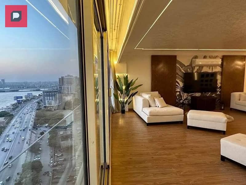 Service apartment for sale on the Nile in Maadi Corniche, finished with Acs and furniture,  on the 14th floor, overlooking Nile 5