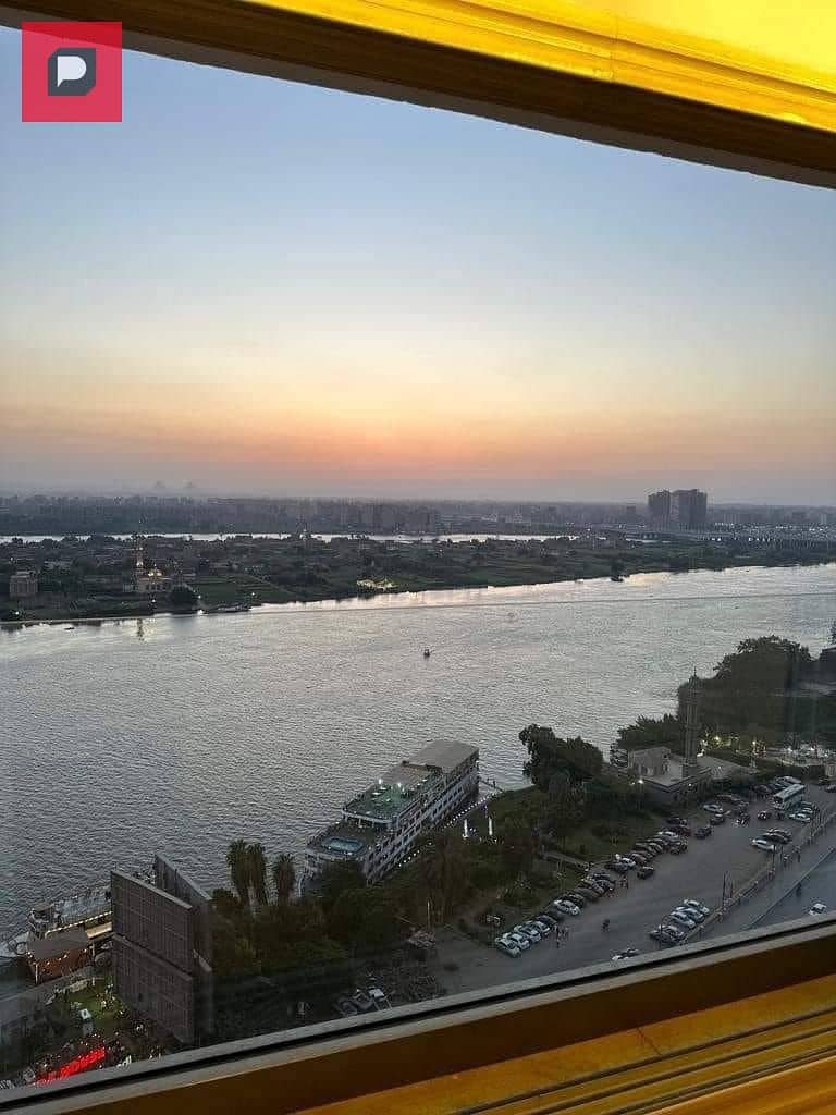 Service apartment for sale on the Nile in Maadi Corniche, finished with Acs and furniture,  on the 14th floor, overlooking Nile 9