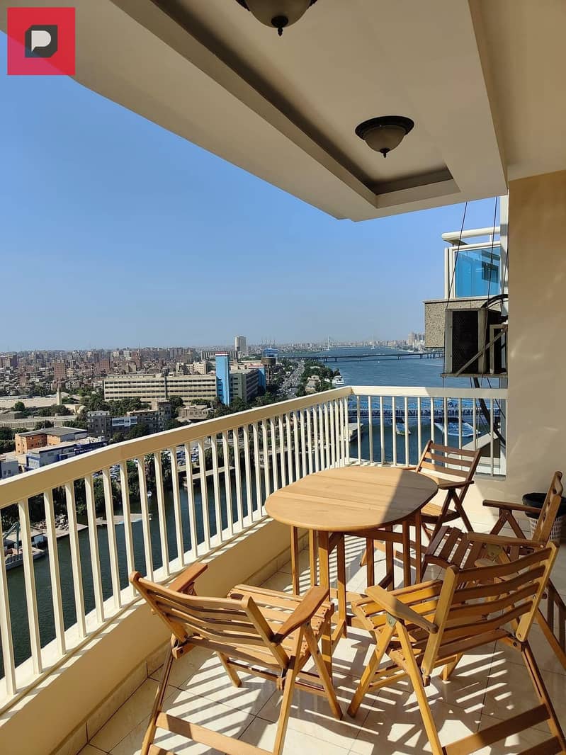 Service apartment for sale on the Nile in Maadi Corniche, finished with Acs and furniture,  on the 14th floor, overlooking Nile 12