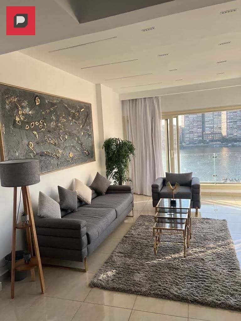 Service apartment for sale on the Nile in Maadi Corniche, finished with Acs and furniture,  on the 14th floor, overlooking Nile 16