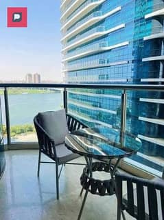 Apartment for sale in Reve Maadi, near Zamalek and Maadi, minutes from the ring road, immediate receipt, fully finished and furnished, under hotel sup 0